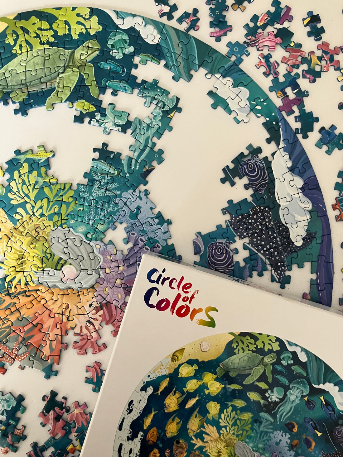 Partially completed ocean circle shape puzzle from the Ravensburger Circle of Colors range